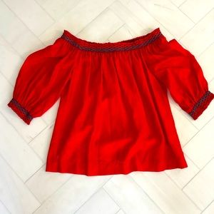 Trina Turk silk off the shoulder top with smocked blue and orange stitching!
